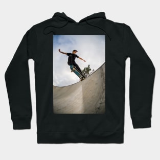 Skateboarder doing a tail slide Hoodie